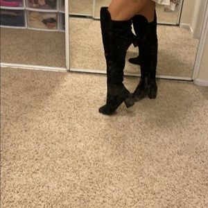 Black tall boots leather
